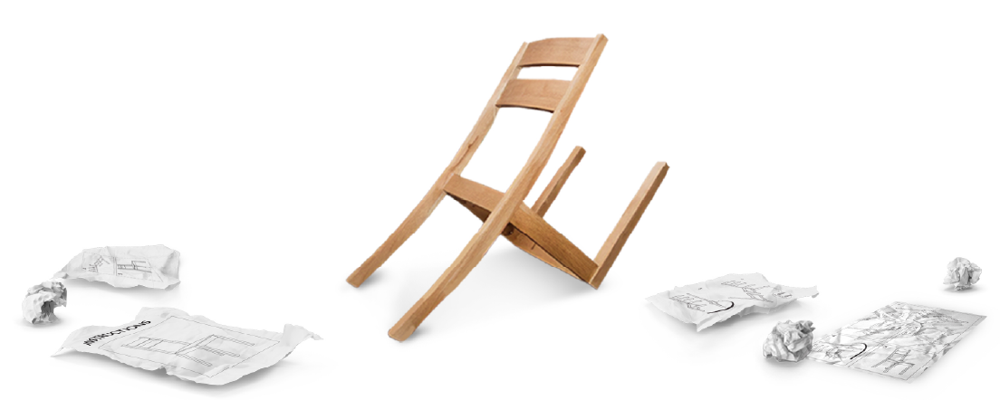 Flipped chair with crumpled balls of paper around it